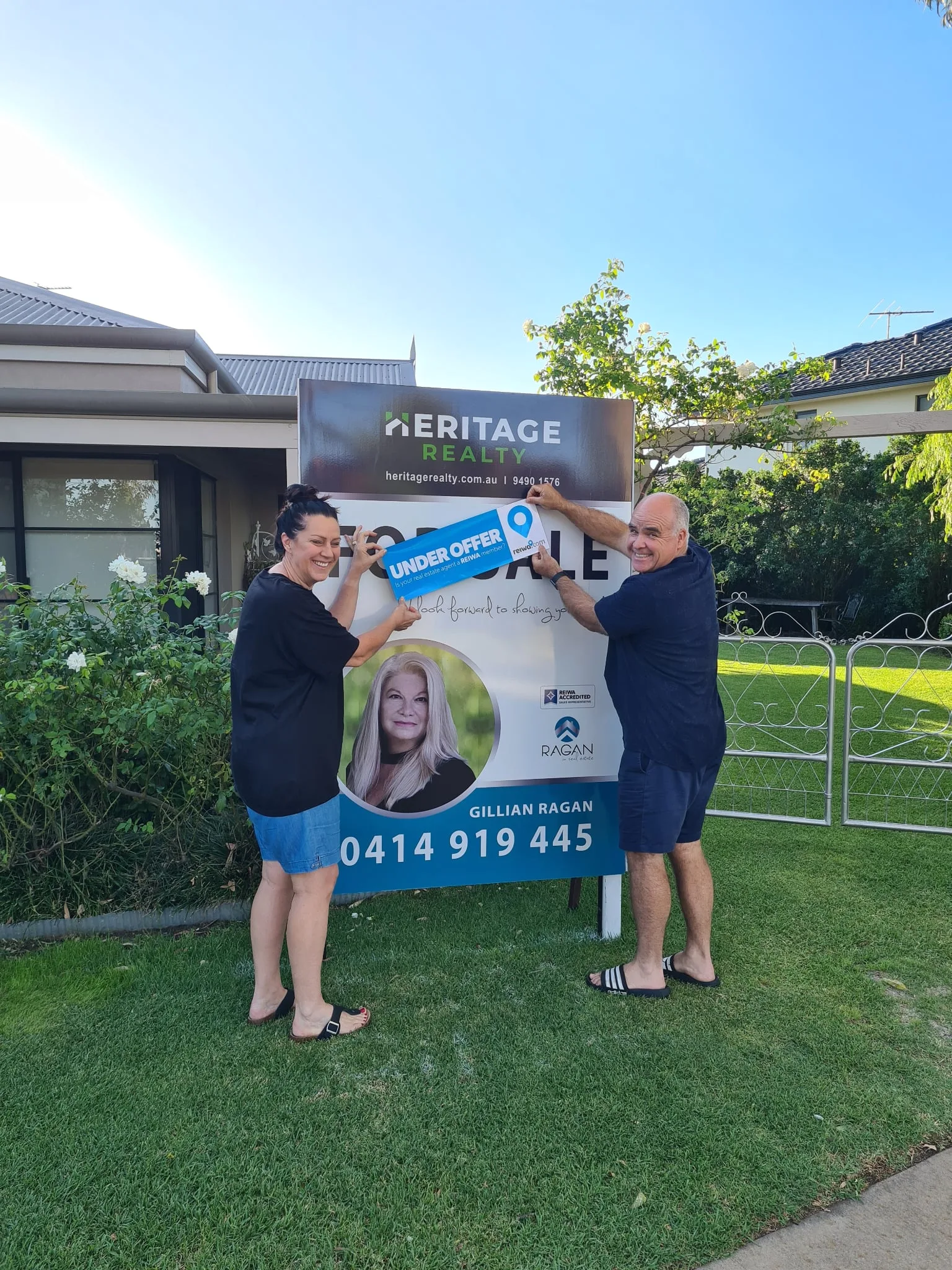 Happy sellers celebrating with Gillian Ragan